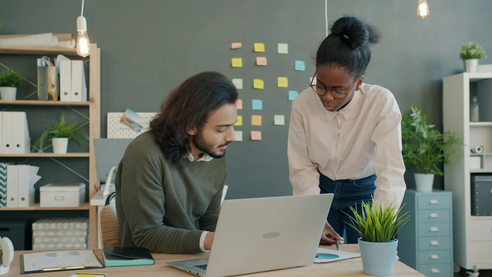 Two colleagues working through a plan