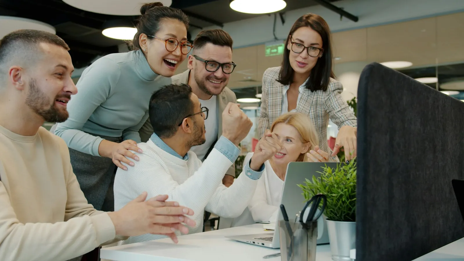 A growth team celebrating a launch
